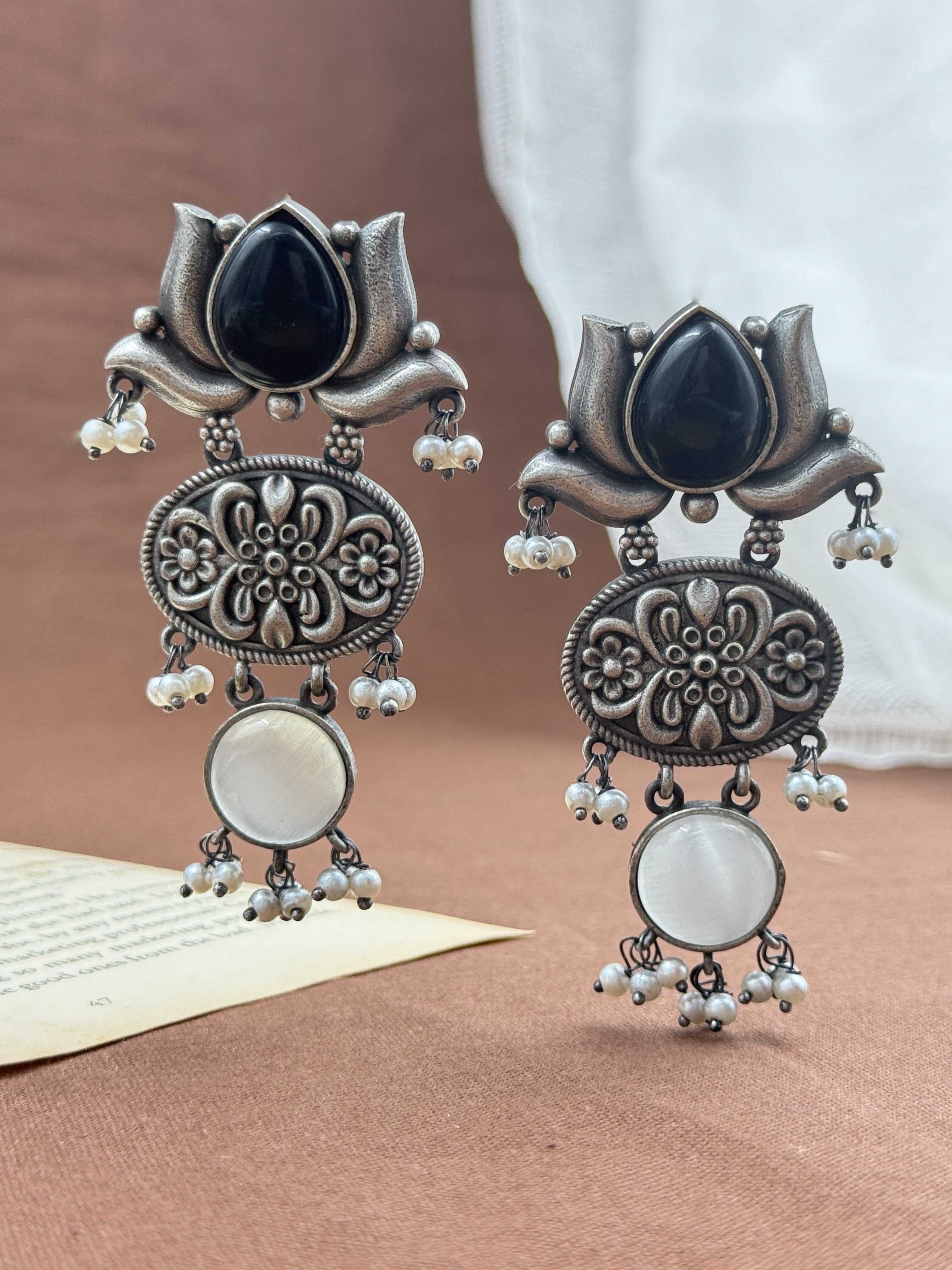 lotus earrings, oxidised earrings, white pearl earrings, silver oxidized earrings, kundan earrings, monalisa stone earrings, black and white stone earrings