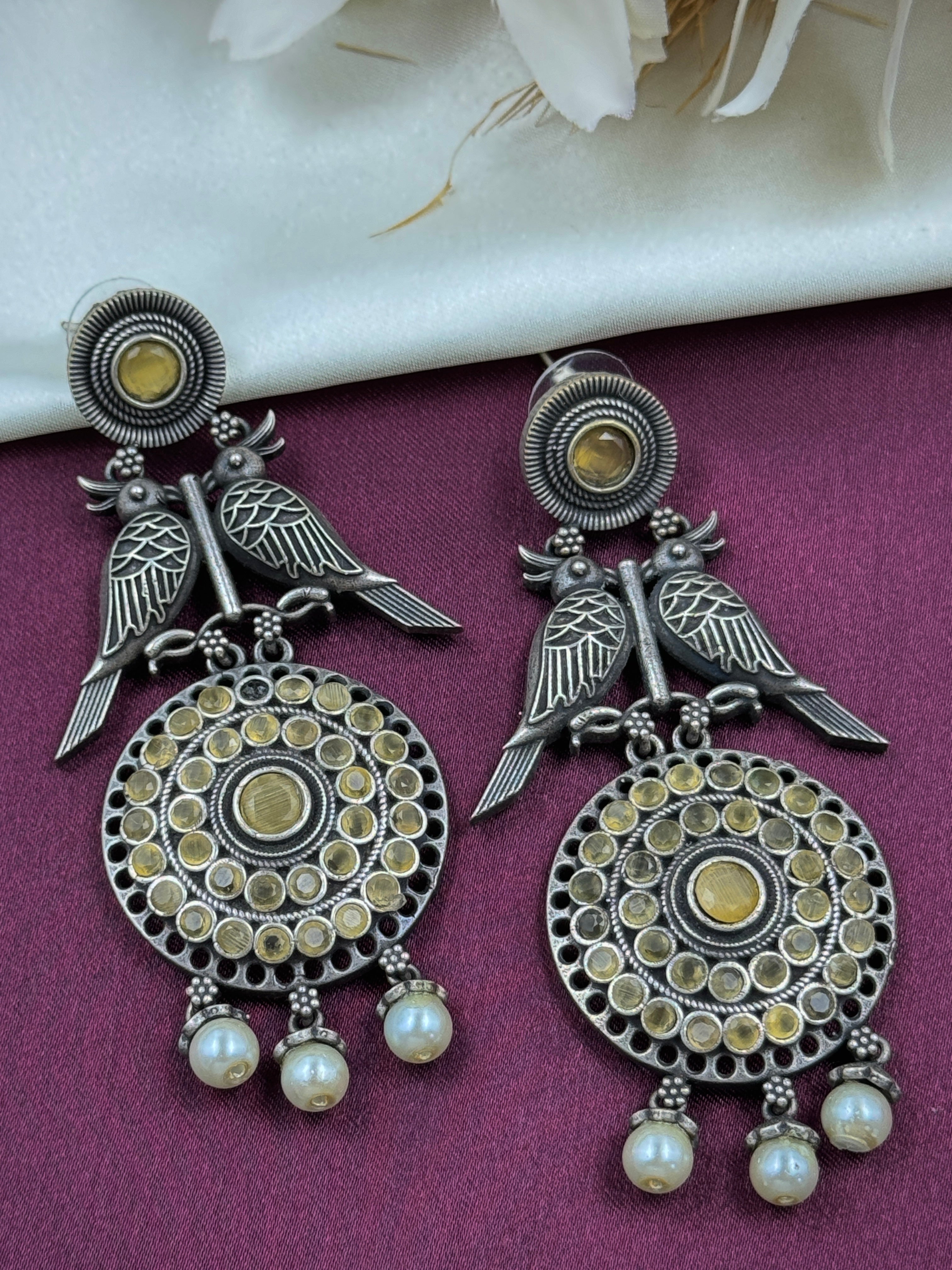 oxidised earrings, oxidized earrings, hoops, studs, tops, bird earrings, bird design, white pearl earrings, kundan, monalisa stone, yellow stone earrings